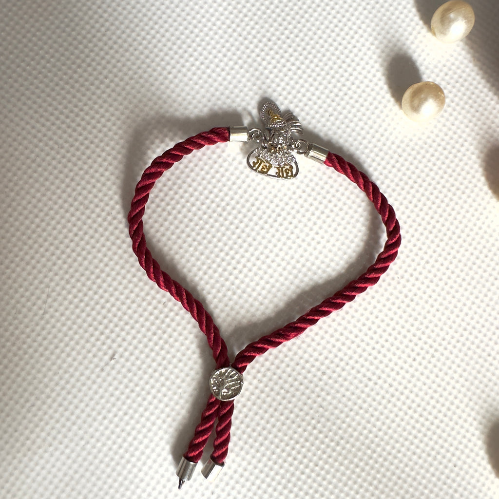 Radhe Radhe Krishna Face Rakhi – 92.5 Silver Finish with Adjustable Maroon Thread