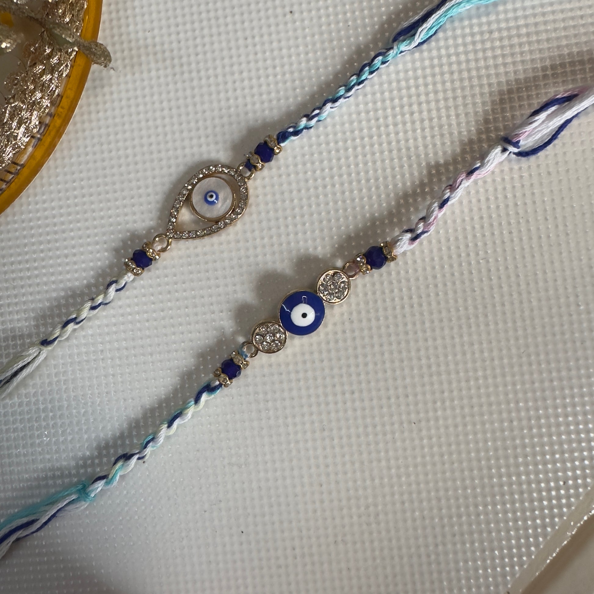 Evil Eye Rakhi Set – Handcrafted Protection & Elegance (Set of 2)
