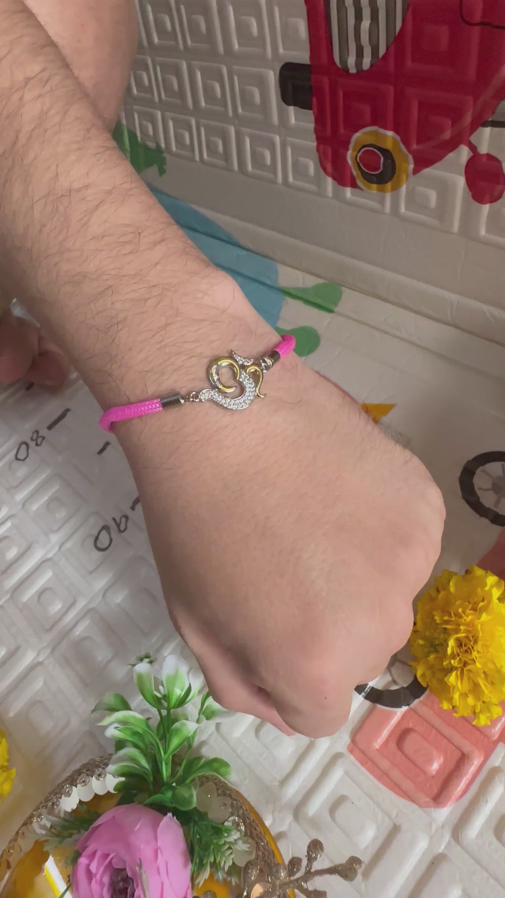 93.5 Silver Om Rakhi – Pink Thread Edition